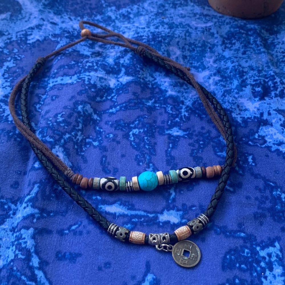 Unisex, leather, tribal style, adjustable choker.